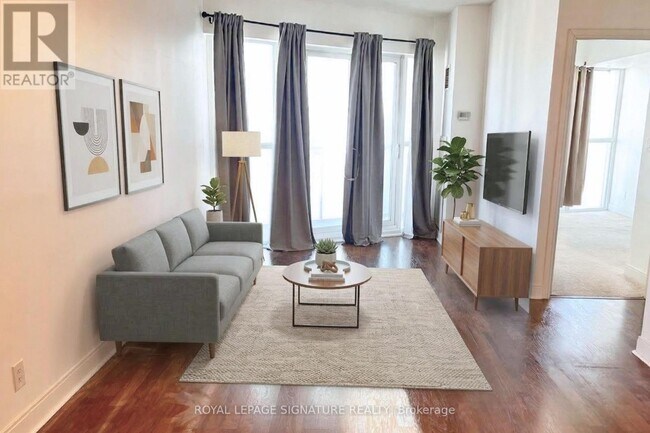 Photo du bâtiment - 50 Absolute Ave