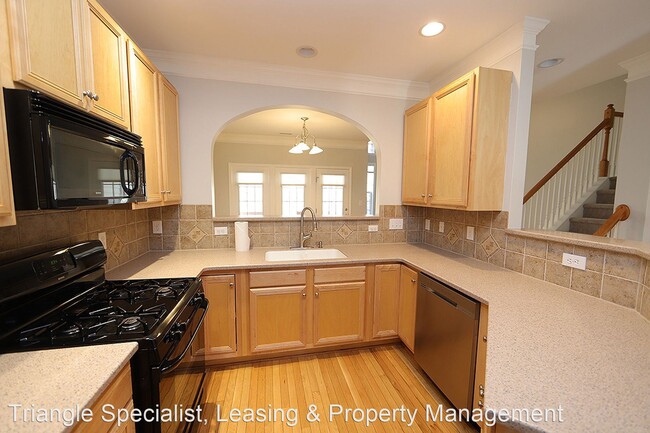 Building Photo - 3 br, 2.5 bath House - 5947 Four Townes Lane