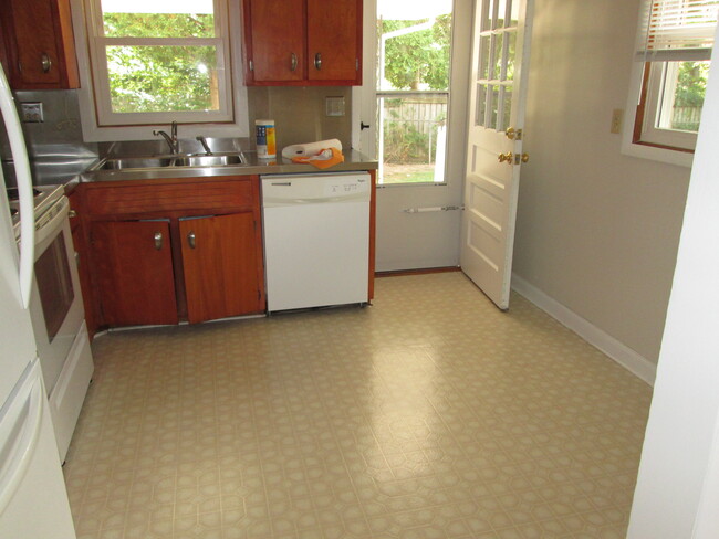 Kitchen & door to carport - 612 Broce Dr