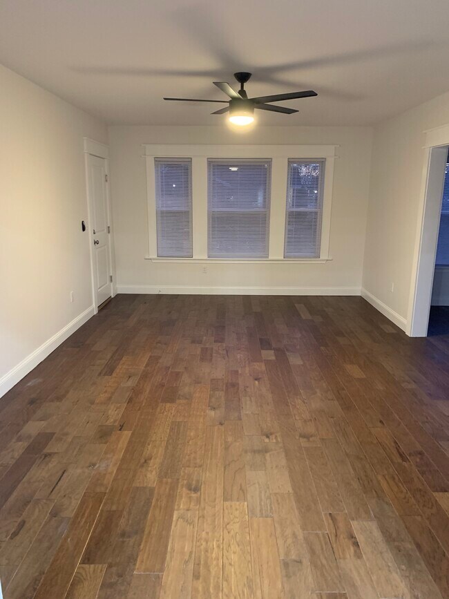 Living room new wide plank flooring - 826 Hood St