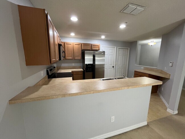 Building Photo - Three bedroom, 2 and half bath, 2 story to...