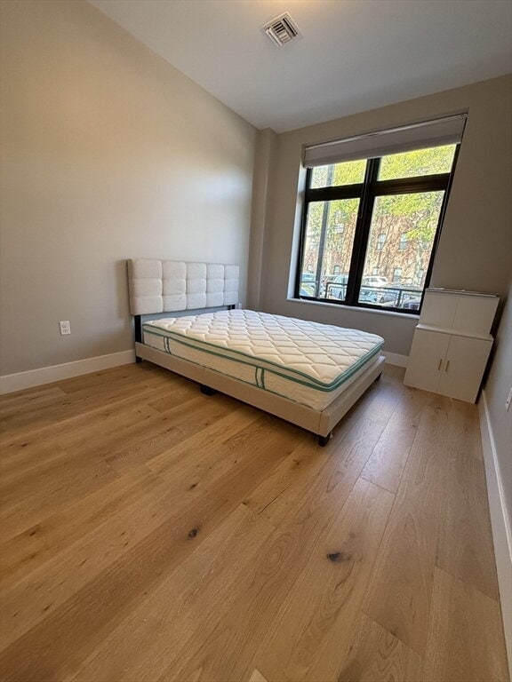 Photo - "Charming 1-Bed Boston Retreat with Granite Touches, Cozy Fireplace & Hardwood Elegance!" Apartment