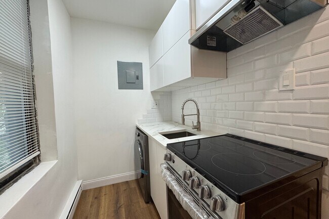 Foto del edificio - 30 E 127th St