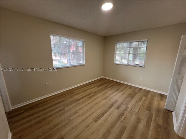 Building Photo - 202 Sable Palm Way