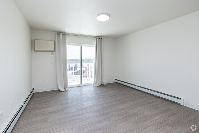 1BR, 1BA - 705SF - Living Room - Rail 10 Apartments and Lofts