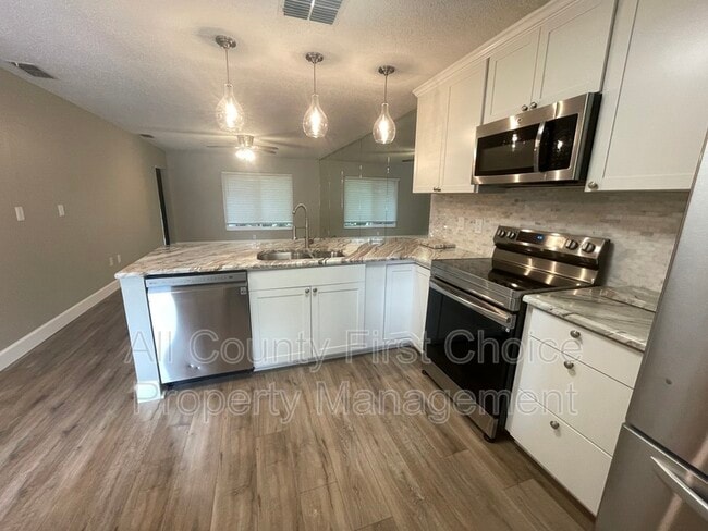 Building Photo - 7633 Piping Rock Ct