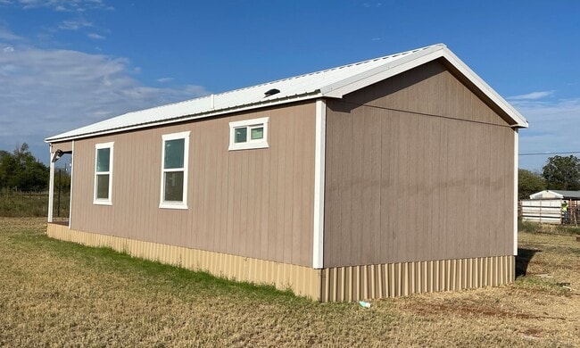 Building Photo - Sunset-Side Mini Home – Your Cozy Retreat ...