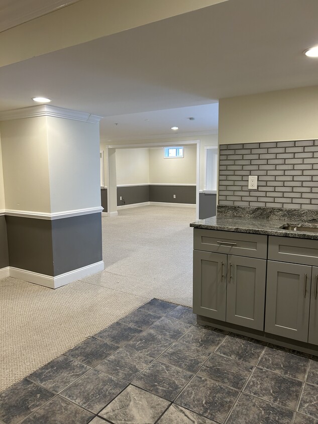 Kitchen leading to living room - 9809 Hammer Ln