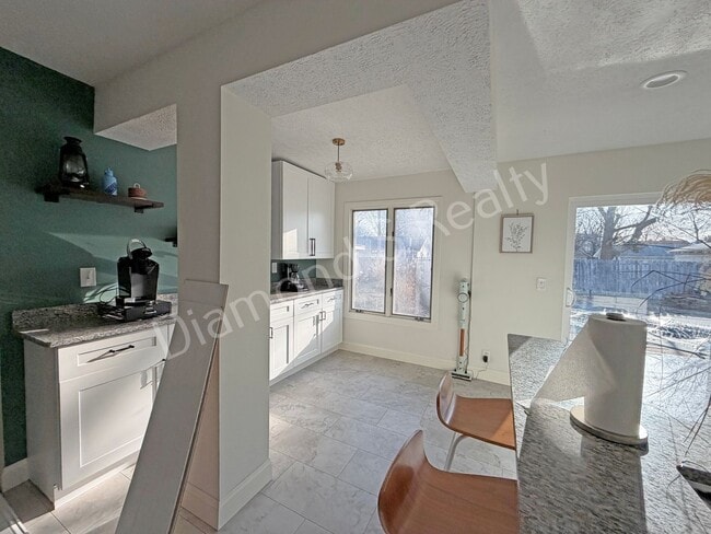 Building Photo - Stunning 3_Bed Home with Two Primary Suites & a Pool!