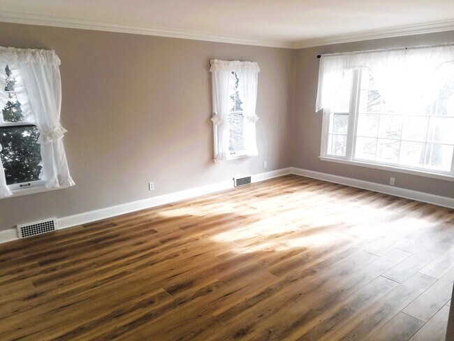 Living Room with all new flooring and paint in 2023 - 504 Euclid Ave
