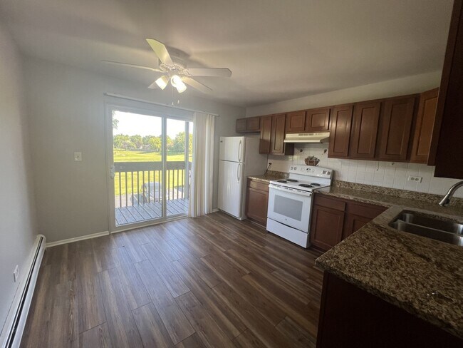 Building Photo - 8238 Woodland Dr