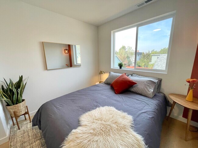 Second bedroom, upstairs – both bedrooms have big closets - 6975 NE Multnomah St