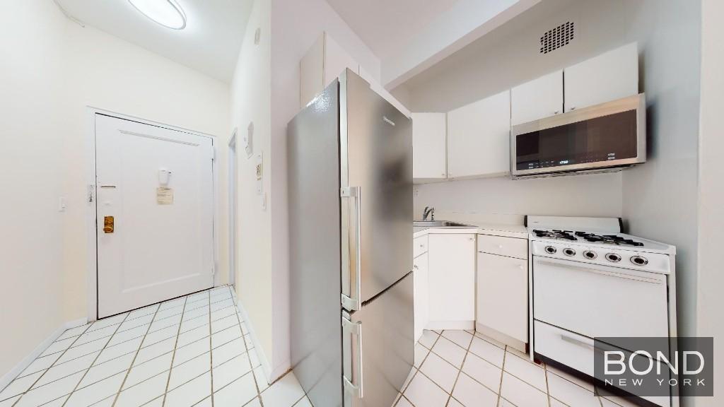 Foto del edificio - 225 E 10th St