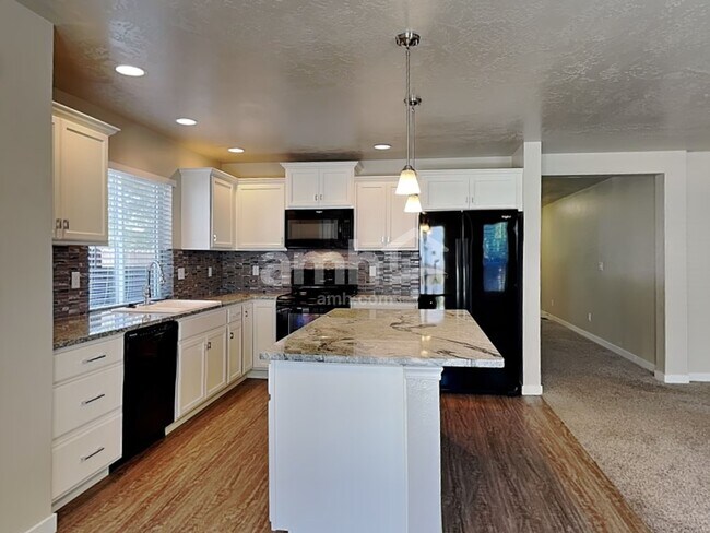 Foto del edificio - 9860 W Mossywood Dr