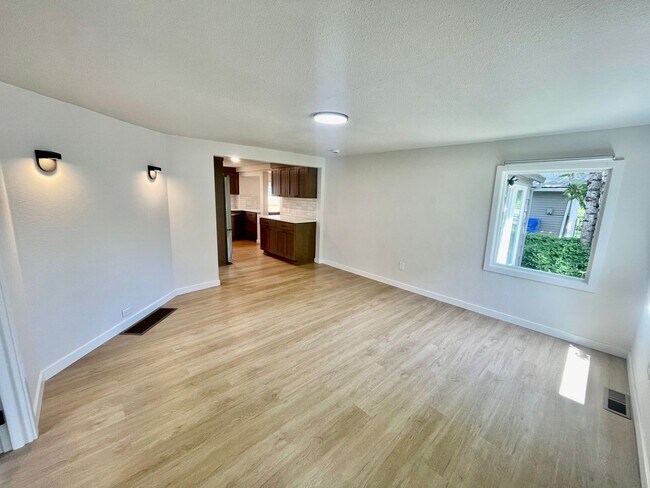 Photo - 5-Bedroom, 2 Bathroom Home with In-Unit Wa...