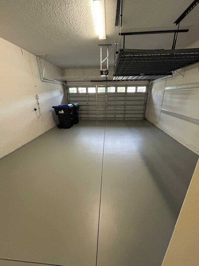 Large garage with storage - 6024 Sunset Isle Dr