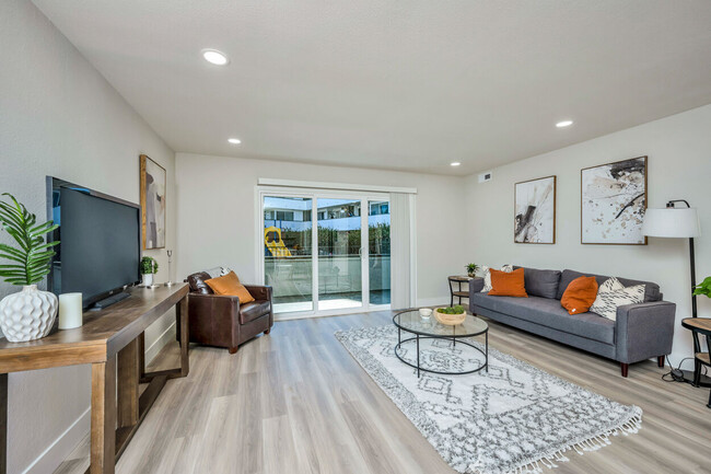 Living Room With Wooden Flooring - The Meridian