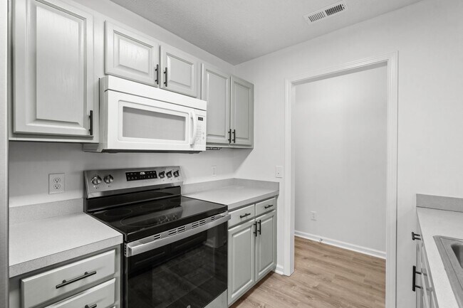 Building Photo - Gorgeous Totally Remodeled 3/3 w/ 2 Car Garage in Surfside-Small Dog Permitted