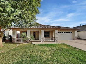Building Photo - 9665 E Olla Ave
