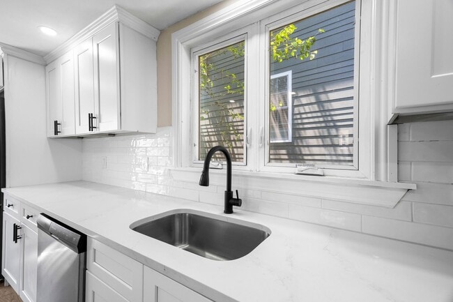 Building Photo - Beautifully Renovated 4-Bedroom Home in Ea...