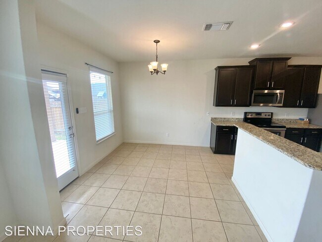 Foto del edificio - 4 br, 2.5 bath House - 6181 Daisy Way
