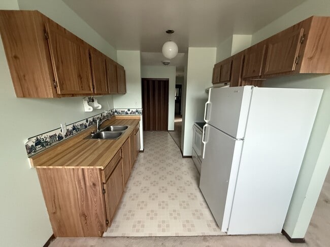 Photo du bâtiment - 301-911-310 10 St