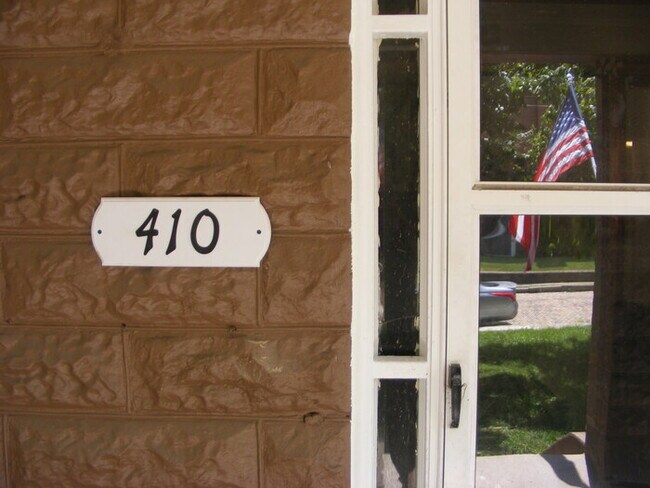 Building Photo - Located on a quiet shady street!