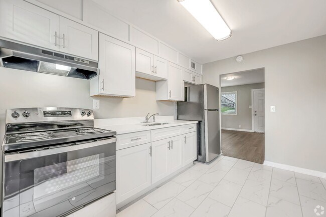 Building Photo - 3-Bedroom Garden-Style Apartment