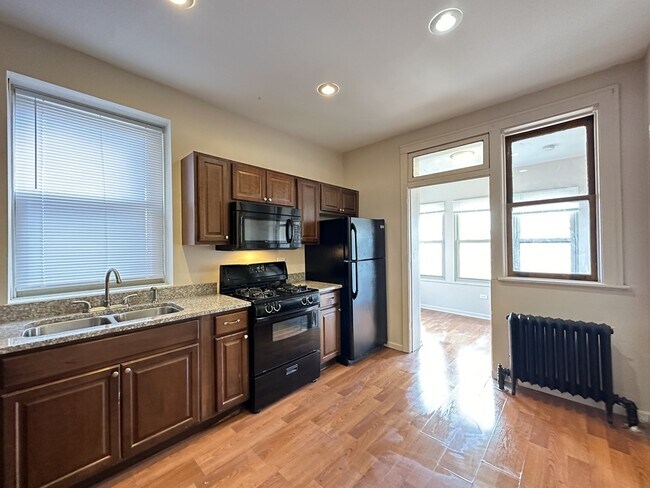 Foto del edificio - 5023 N Ridgeway Ave