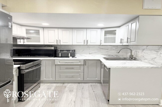 Photo du bâtiment - Spacious 2-Bedroom Basement Unit in Toront...