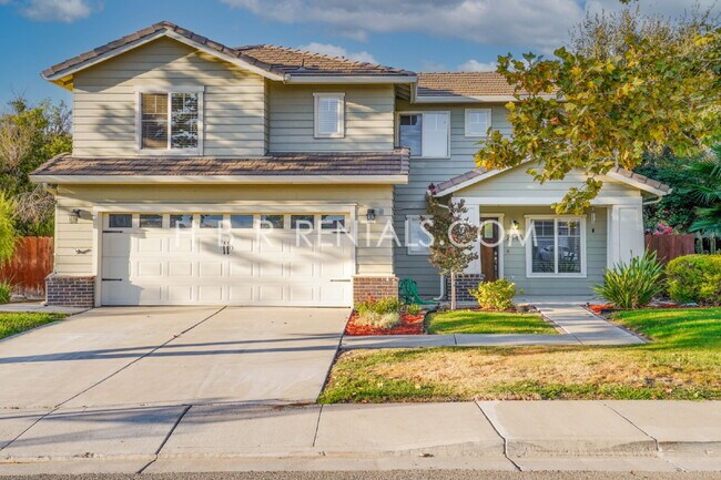 Building Photo - Bright Craftsman-Style 4 Bedroom Home in Q...