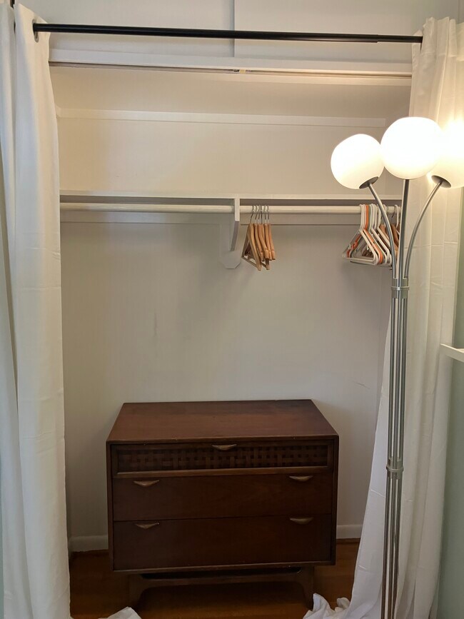 Closet with Dresser and Clothes Hangers - 9718 48th Pl