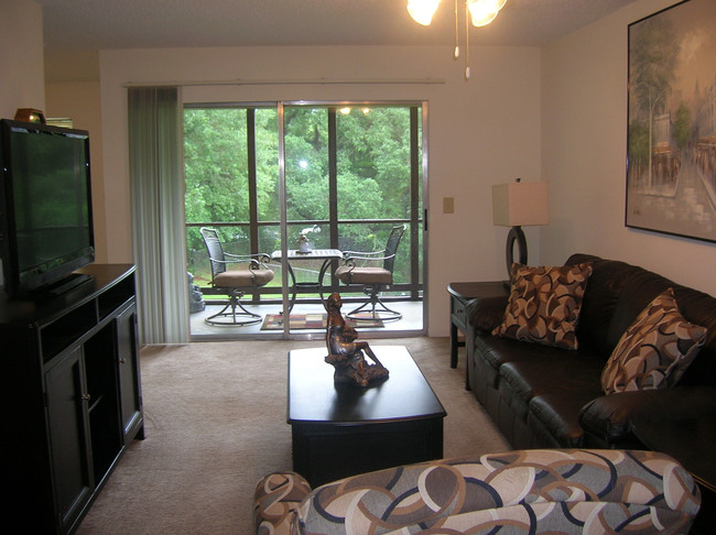 3 Bedroom Living Room - Creekwood Apartments