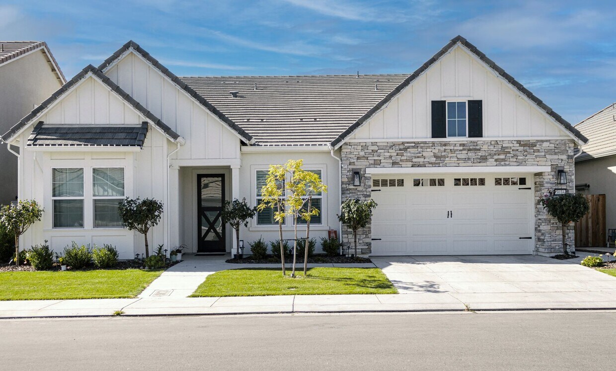 Primary Photo - High-End 4 Bedroom Home with Solar