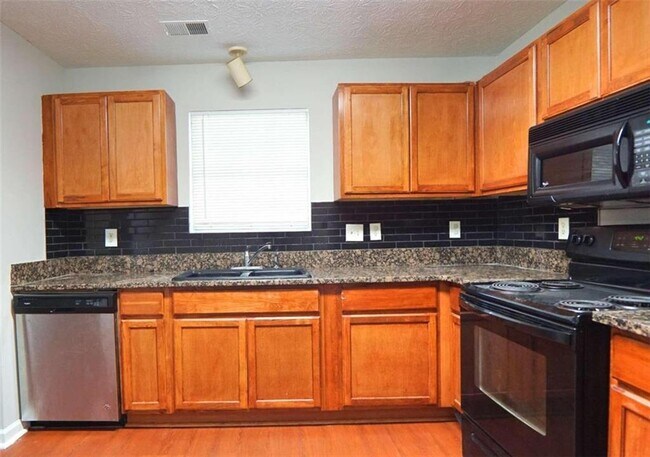 Building Photo - 5784 Wind Gate Ln