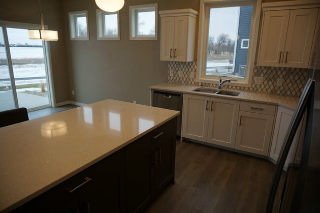 Large kitchen (Photos are of similar unit with similar finishes.) - 3811 Stacy Drive