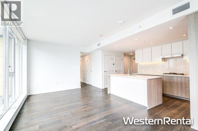 Photo du bâtiment - 3200-3200 Corvette Way