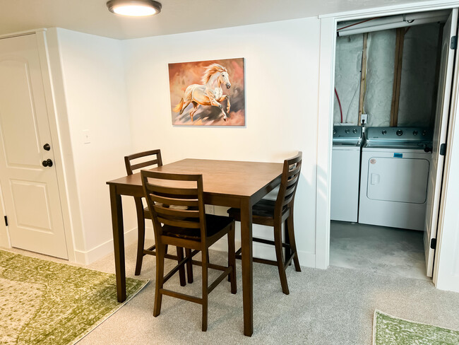 dining room area/ laundry room - 70 E Craner Peak Dr