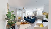 Located at 701 Watkins View Dr in Midlothian, VA, this thoughtfully designed 2-bedroom, 2-bathroom residence offers a comfortable and modern living experience across a single floor. The open-concept layout seamlessly connects the living room, dining area, and kitchen, creating a spacious and inviting atmosphere filled with natural light from multiple windows. The living room features warm wood-look flooring, a ceiling fan, and ample space for relaxing and entertaining.

The kitchen is well-equipped with gray shaker-style cabinetry, granite-look countertops, a subway tile backsplash, and a full suite of stainless steel appliances including a refrigerator, dishwasher, range, and over-the-range microwave. Pendant lighting over the island and a large window above the sink enhance the space's bright, functional character.

The primary bedroom is a comfortable retreat with plush carpeting, a ceiling fan, and direct access to a private bathroom featuring a dual-sink vanity with gray cabinetry and granite countertops. The second bedroom is equally well-lit, with large windows framing pleasant outdoor views. Both bedrooms are served by dedicated closets with built-in shelving. A welcoming entryway with wood-look flooring and clean white walls ties the entire residence together with a cohesive, contemporary aesthetic.