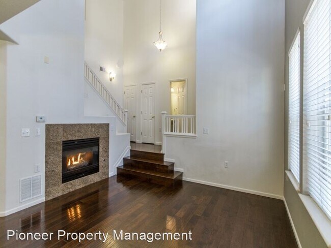 Building Photo - 2 br, 2.5 bath House - 8993 E. 24th Pl.  #101