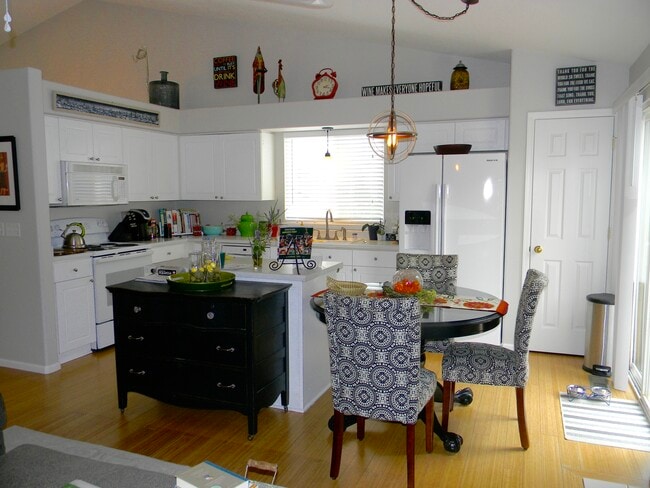 Kitchen..light and bright w/pantry! - 5835 S Harlan St