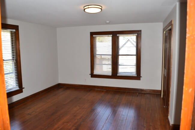 Bedroom Hardwood floors - 319 1/2 Jackson St
