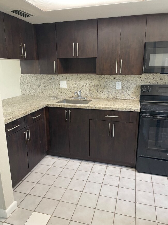 Building Photo - 5947 W 28th Ave