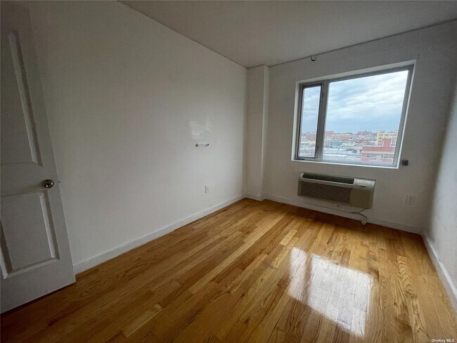 Building Photo - 8106 Dongan Ave