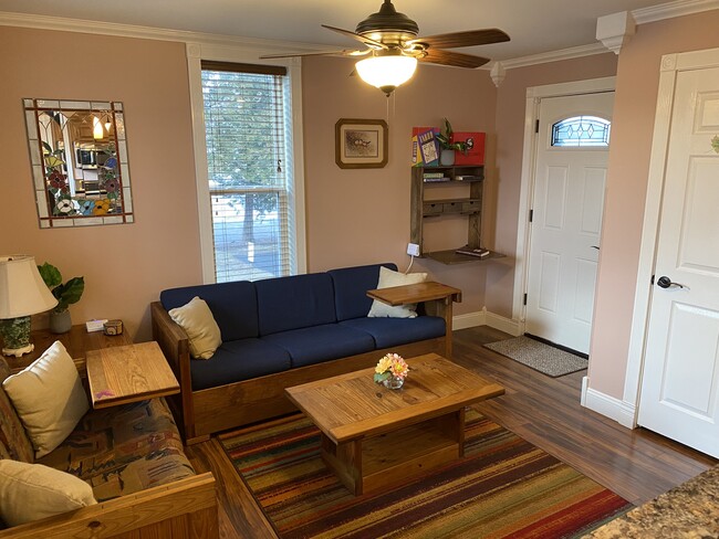 Living room showing desk in open position. - 309 N Davison St