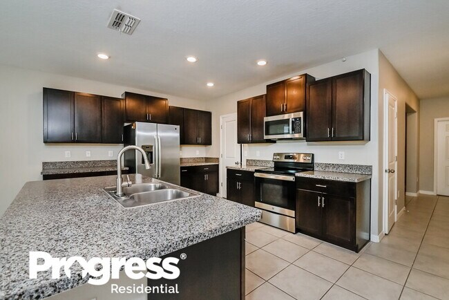Building Photo - 1565 Blue Rose Dr