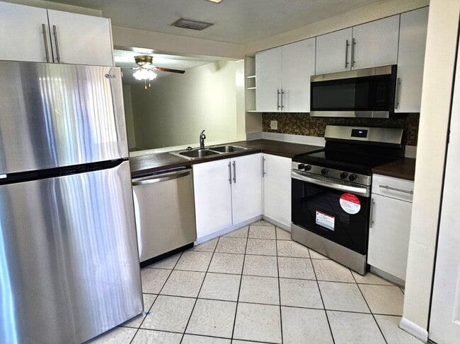 Photo - 8819 Springtree Lakes Dr Townhome