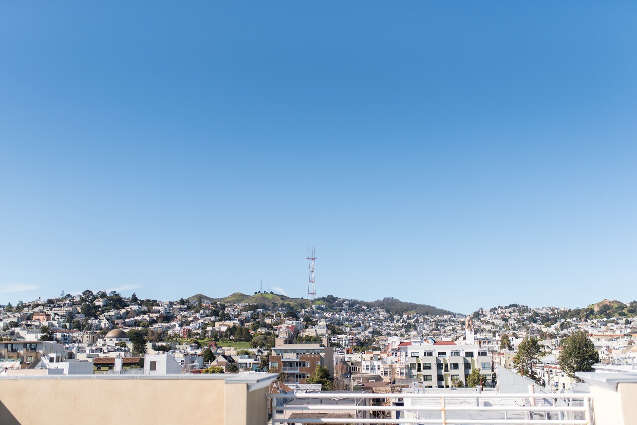 Beautiful view of Twin Peaks from living room, both bedrooms and balcony. - 2208 Mission St