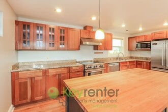 Building Photo - 4439a 44th Ave SW