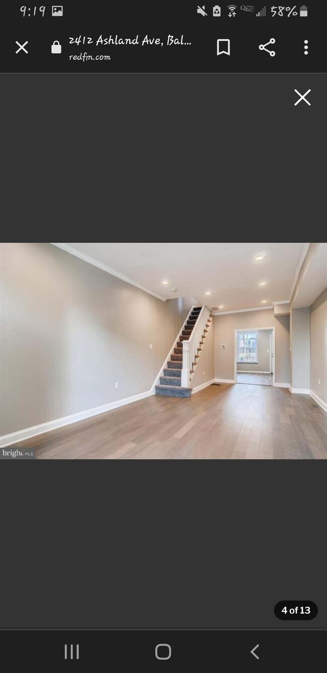 Living room and stairs to go upstairs - 2412 Ashland Ave